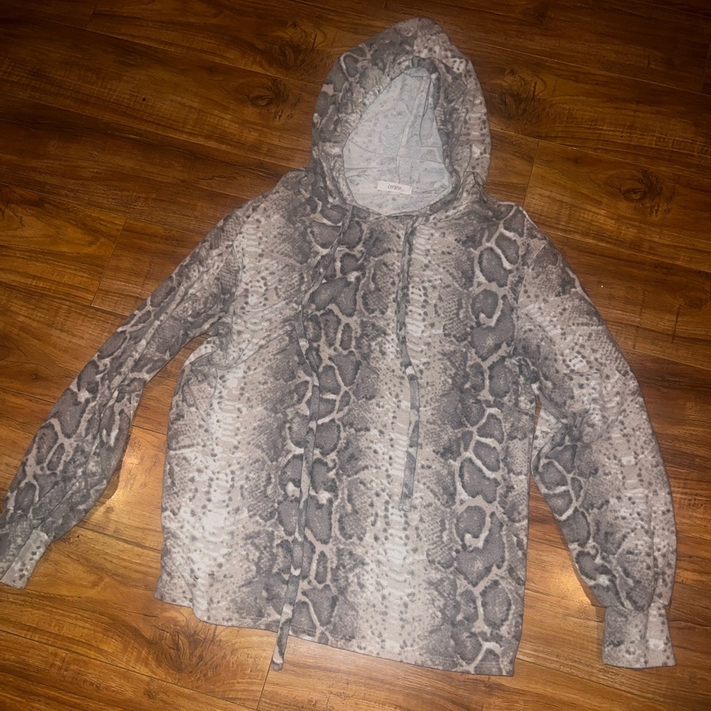 Soft fuzzy light pullover sweater with a gorgeous snack skin design